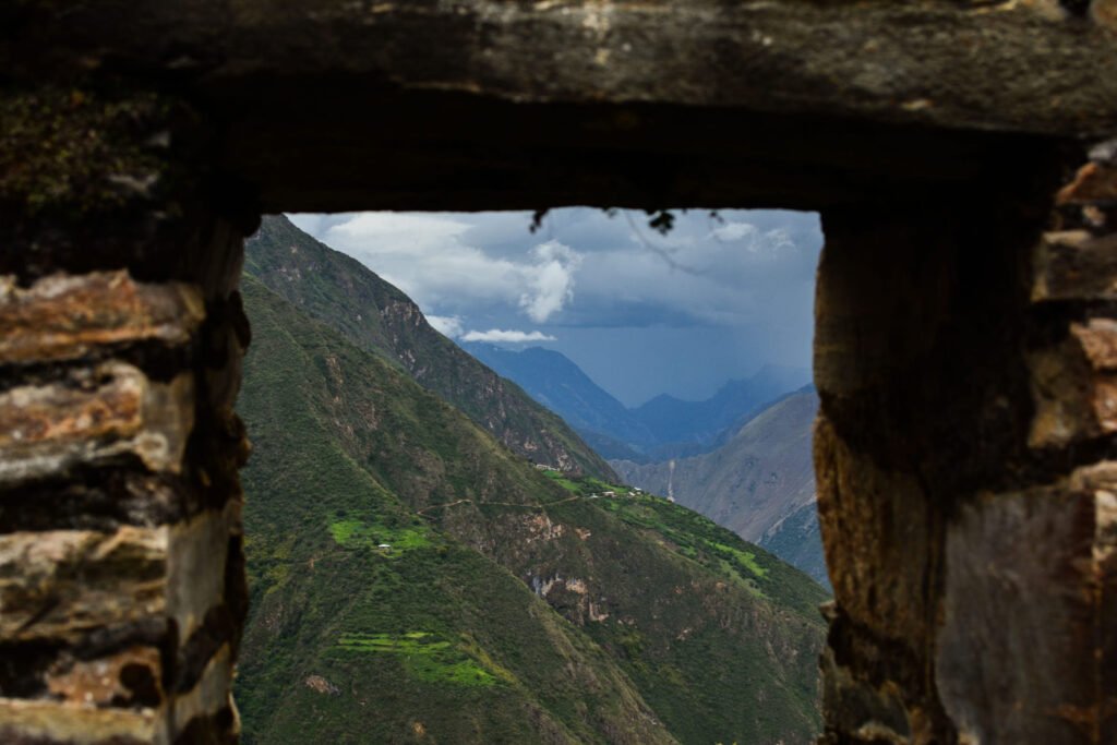 The ruins of Choquequirao provide a nice natural frame looking out into the valleys and mountains