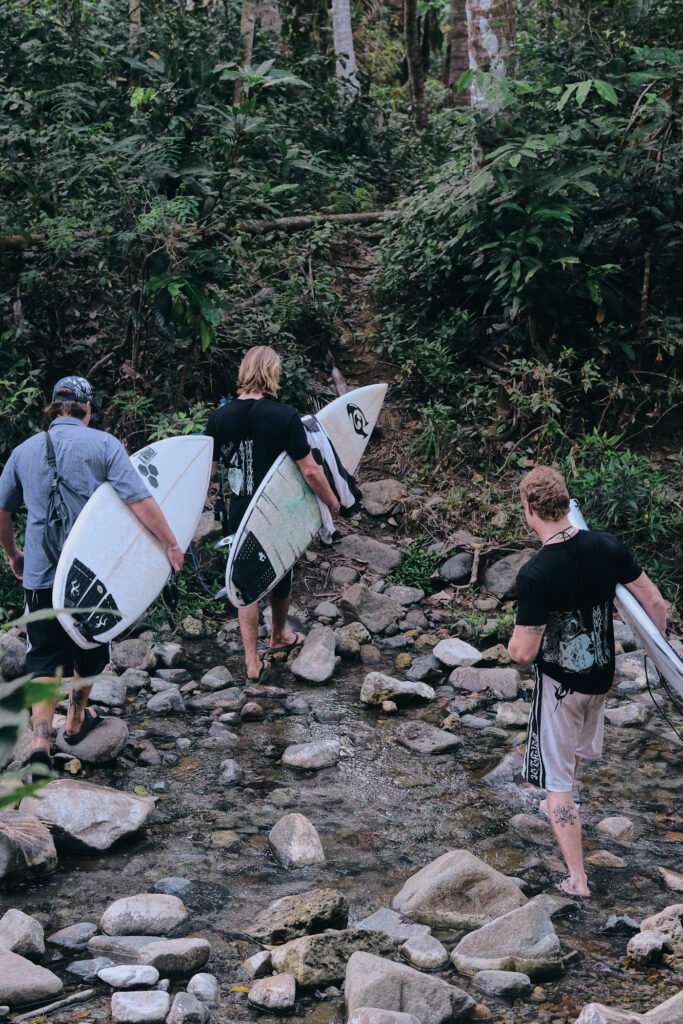 A river crossing intercepts the boys as we make our way to what we thought was the surf break