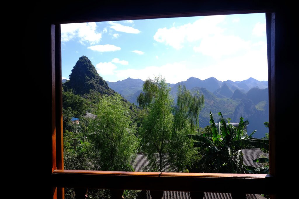 Window views out to the impressive karst limestone valleys of Ma Pi Leng