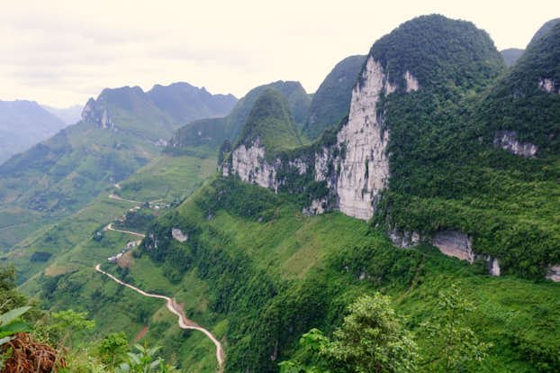 The ginormous white cliff looming in hte distance amongst the impressive valleys