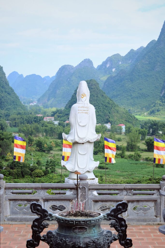 Lady Buddha looking out to the valleys surrounding Ban Gioc temple.