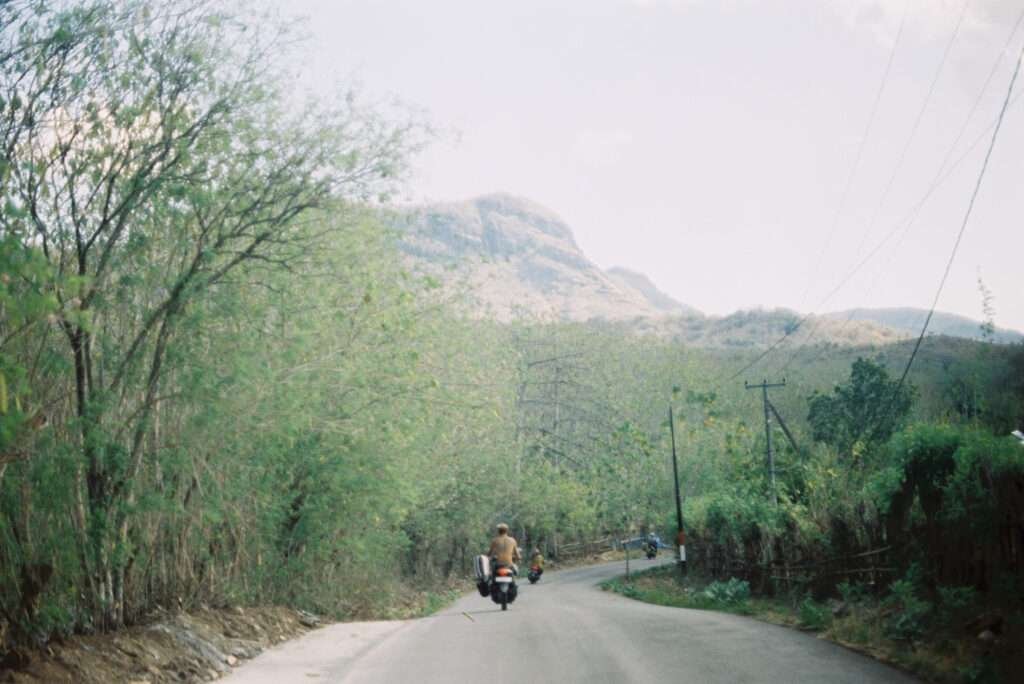 Peeled back shot, taking the road back to Scar Reef homestay, mountain towering in the background